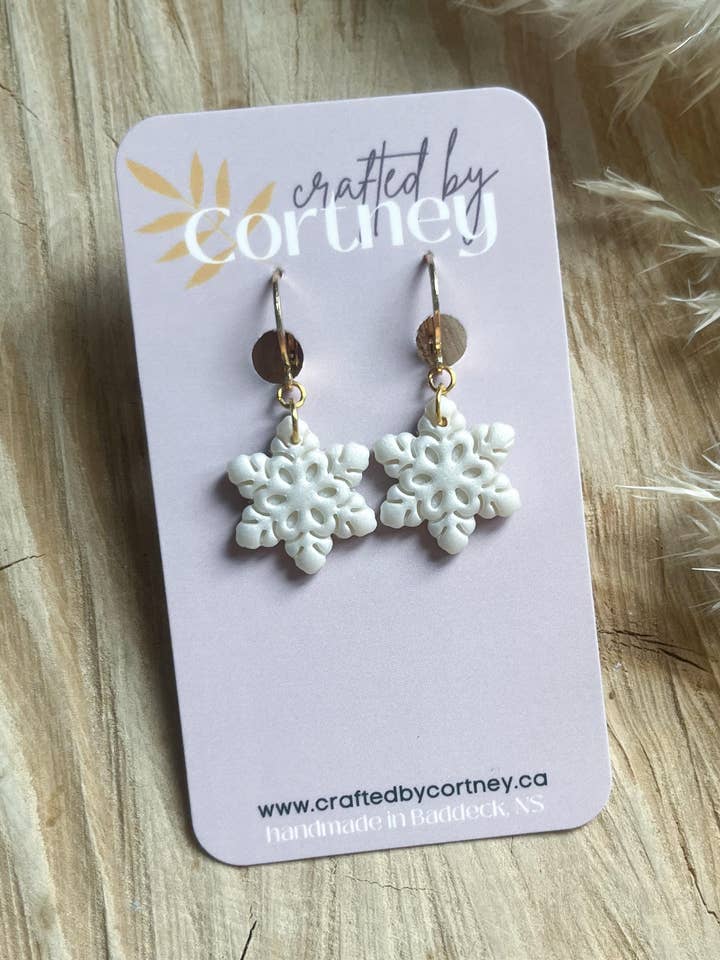 Mini Snowflake dangle leverback earrings for wholesale by Crafted by Cortney