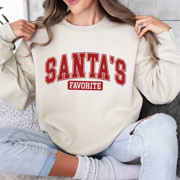 Santa's favorite Christmas sweatshirt, Holiday Season crew for wholesale by ATTA TOOD LLC