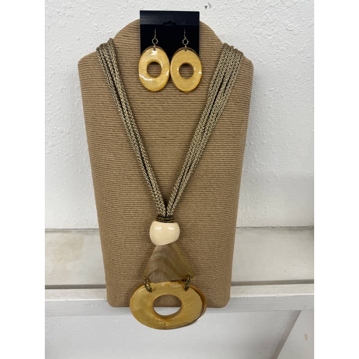 7 STRENGEN NATUURLIJK BRUIN KOORD MET DRIEHOEKIGE BRUINE LIPSCHELP A voor wholesale door International Duru's