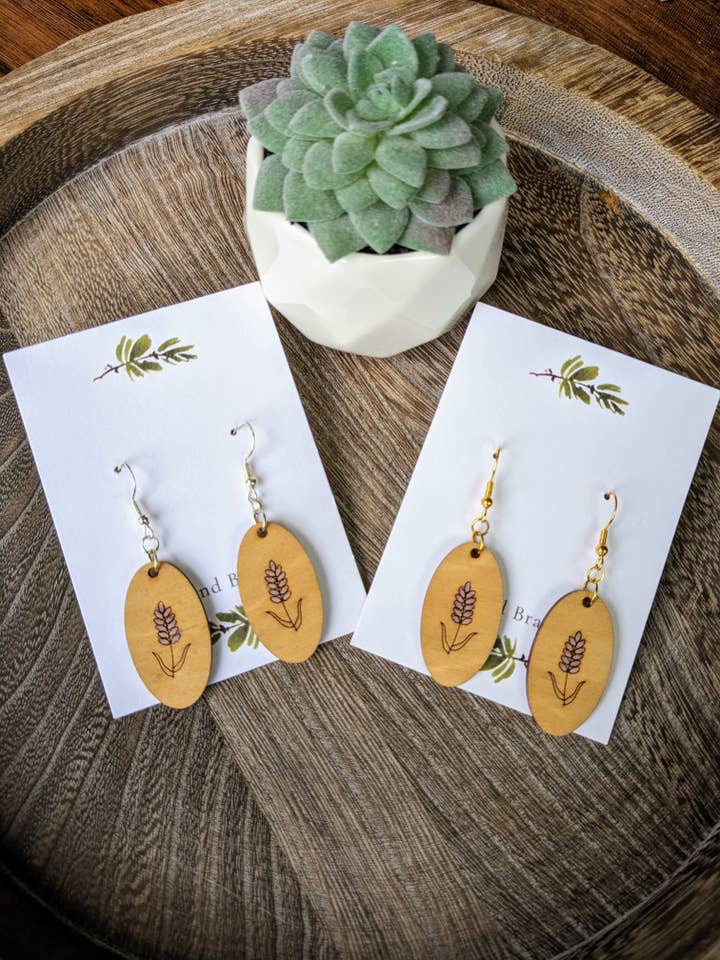 Lavender Oval Wood Earrings | Floral Engraved Wooden Dangle for wholesale by Stag and Branch