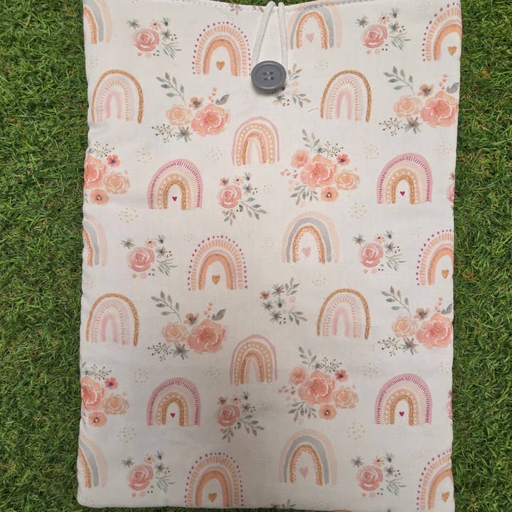 White padded book cover with rainbow and flowers for wholesale by laubelgo