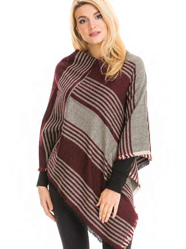 Poncho de punto acanalado con dobladillo deshilachado y cuello en V para venta al por mayor de Cap Zone