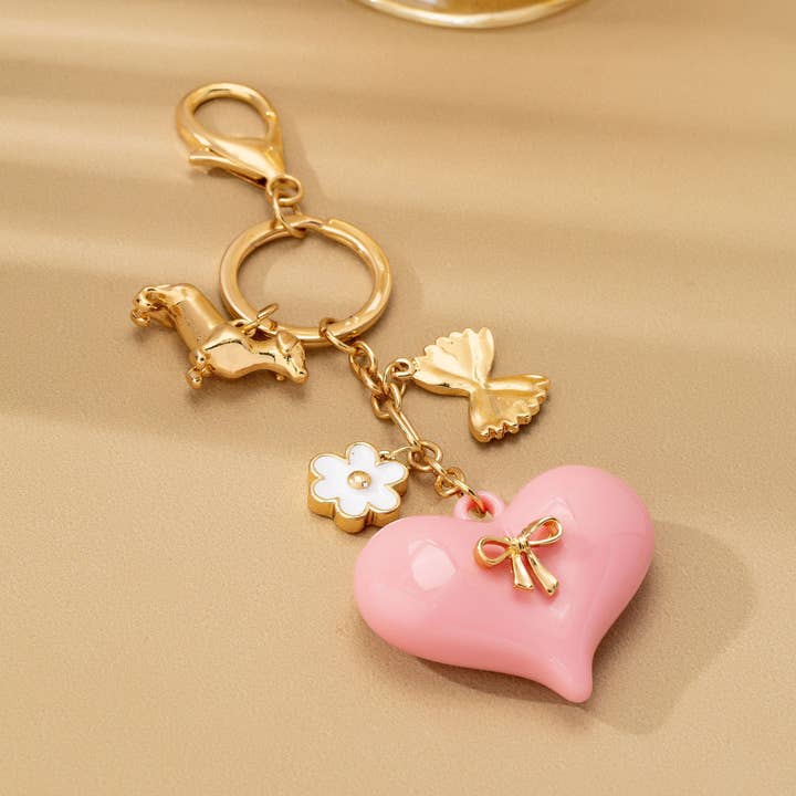 Gold BAG CHARM-HEART DOG BAG CHARM KEY CHAIN | 80K087 for wholesale on Faire1
