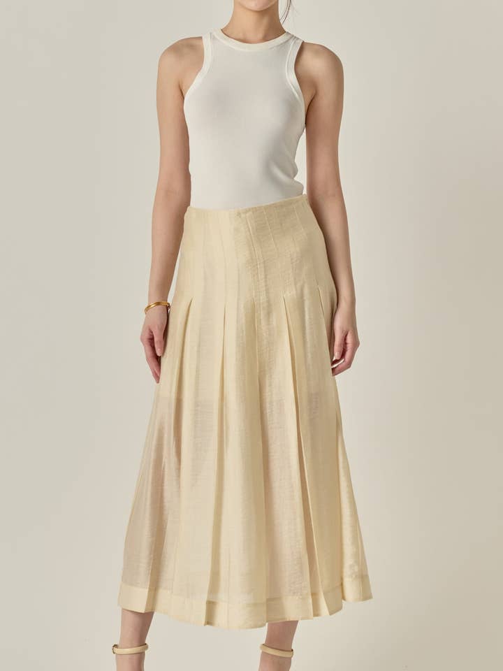 Jupe plissée transparente pour la vente par English Factory