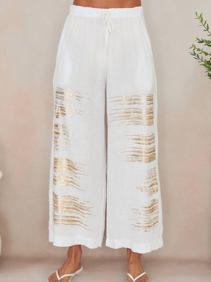 CALÇAS PALAZZO DE LINHO COM RISCA DE FOLHA DOURADA (155043/13868-FOIL) por atacado de MILIO MILANO