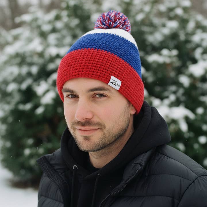 Cappello con pompon GB Snug Fit per la vendita all'ingrosso da parte di ZAINI Lifestyle Ltd