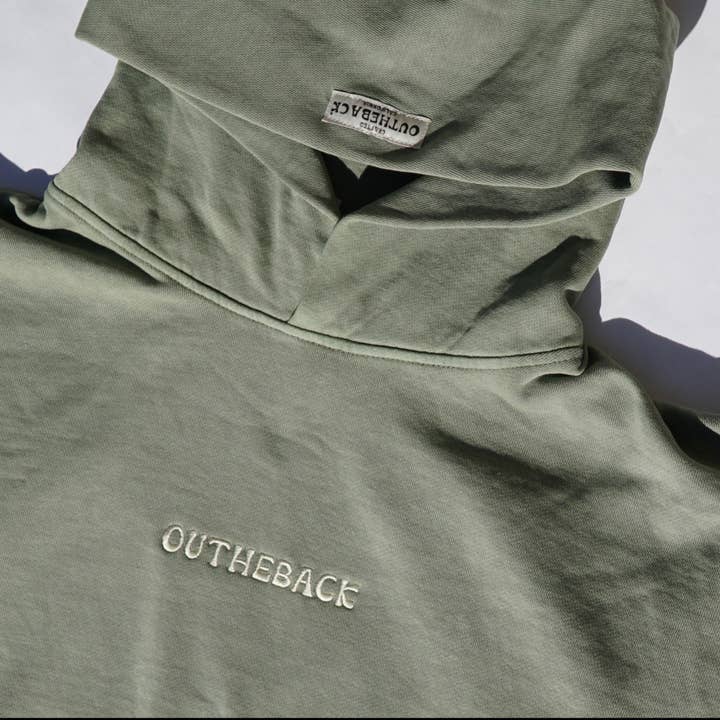 HOODIE MET CAPUCHON VOOR DE GEMEENSCHAP - PASTELGROEN voor wholesale door Out The Back