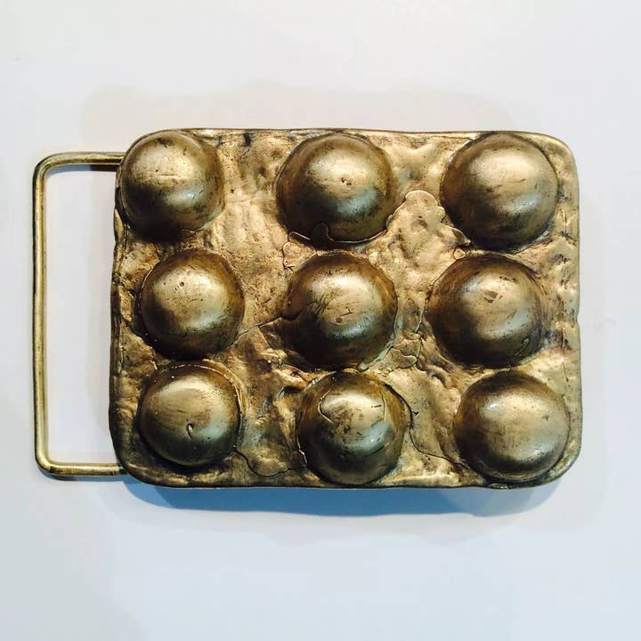 Dalek Buckle for wholesale by JL Merrill Metalworks