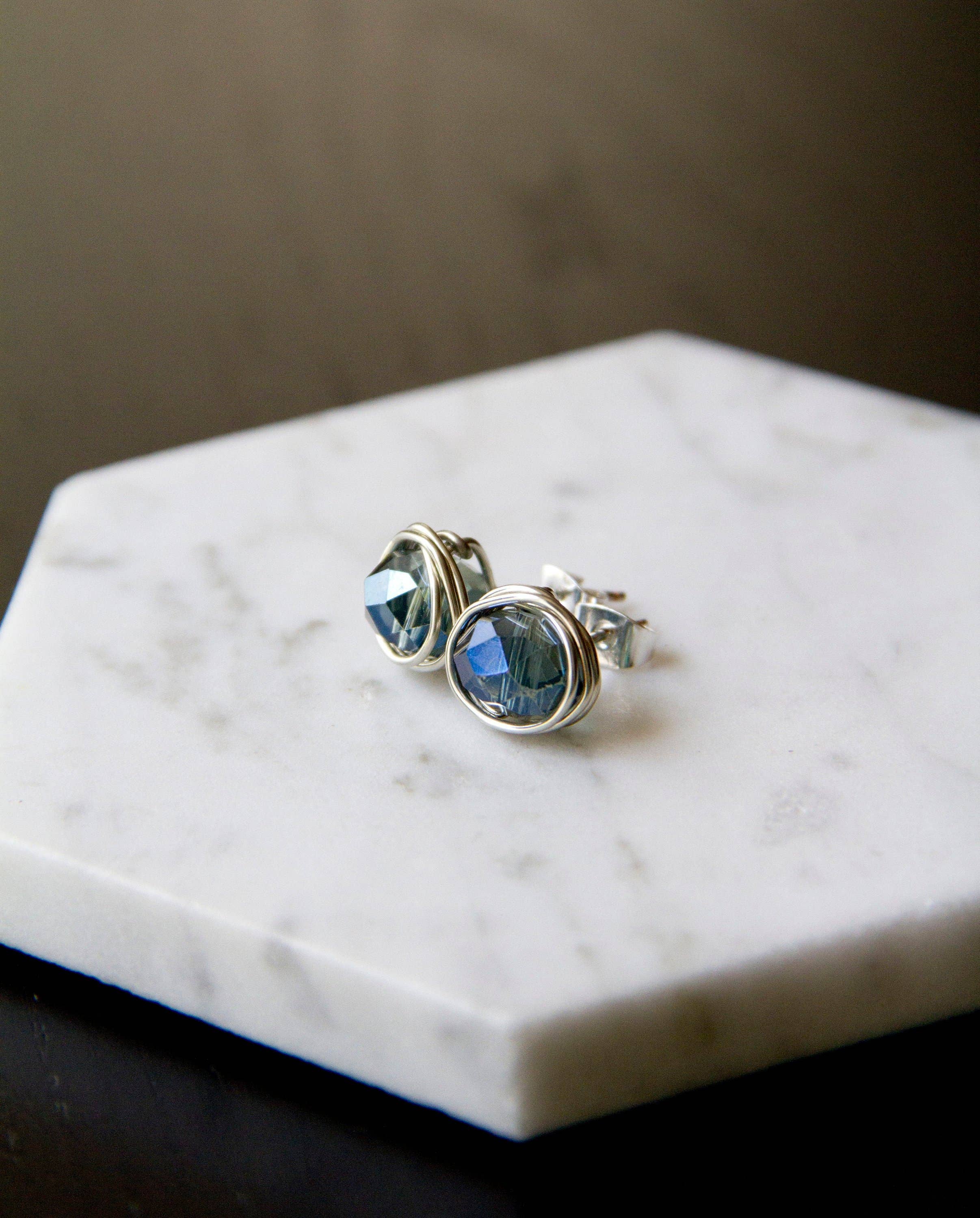 The Jovi Lyne Collection – wholesale Stud/post earrings – Chinese Crystal Stud Earrings Wrapped In Silver - Birthstone - December - Blue