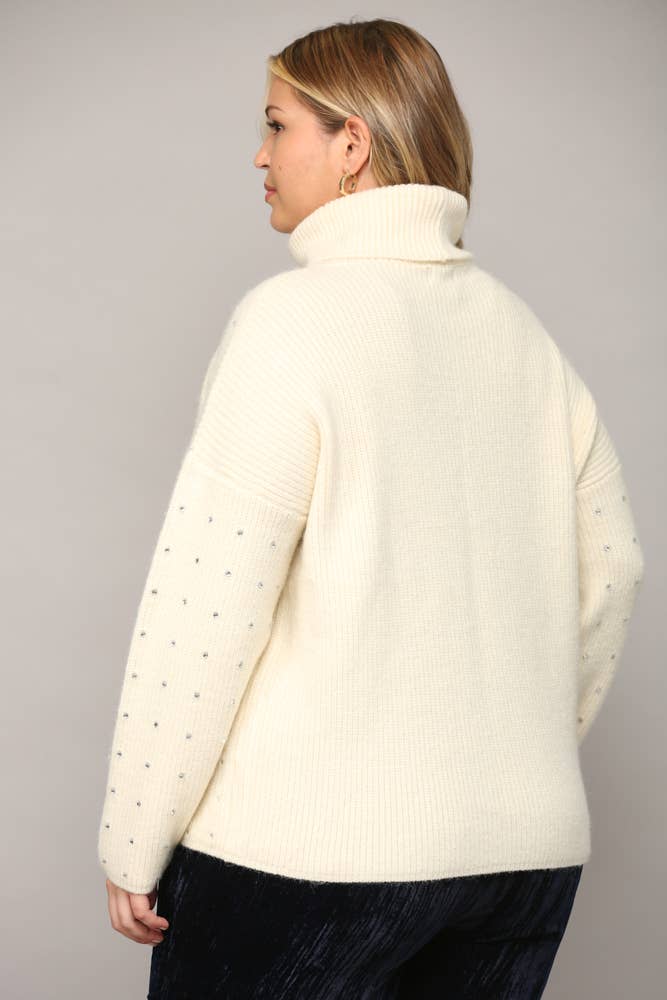 CREMA MAGLIONE A COLLO ALTO IMPREZIOSITO DA STRASS FW9411P in vendita all'ingrosso su Faire3