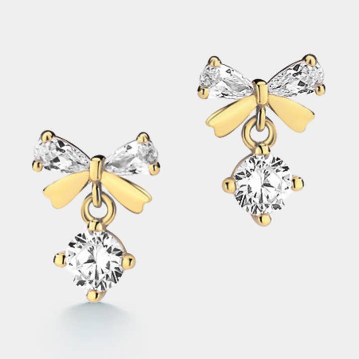 Boucle d'oreille à tige en forme de nœud papillon en or Dainty en argent sterling 925 pour la vente par Perimade & Co. LLC