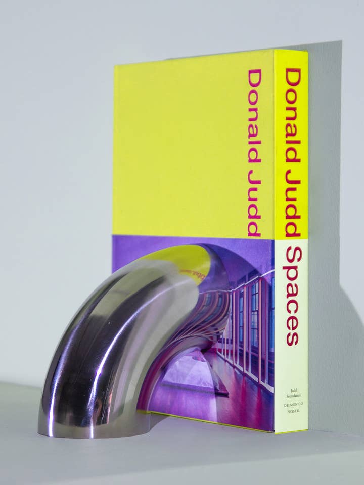 Fermalibri Tubo per la vendita all'ingrosso da parte di Bi-Rite