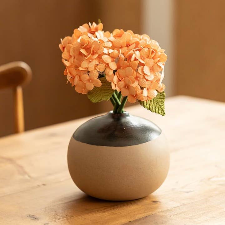 Lille orange papirhortensia for engroshandel hos Flowrette
