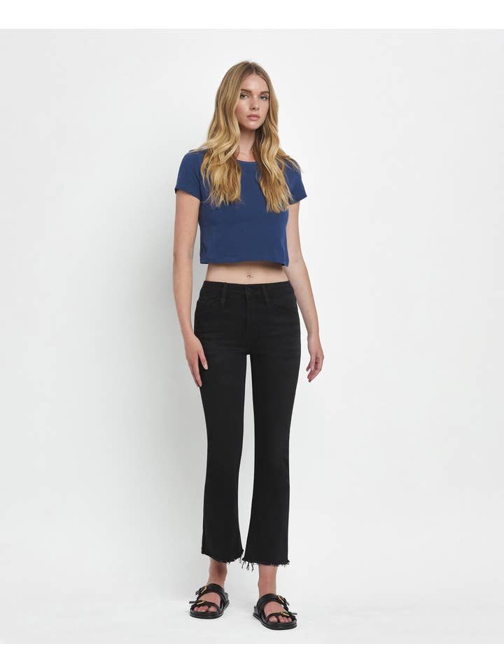 GRANDIOSITÀ JEANS CROP FLARE A VITA MEDIA CON ORLO INVECCHIATO E ORLO GREZZO LV1145 in vendita all'ingrosso su Faire3