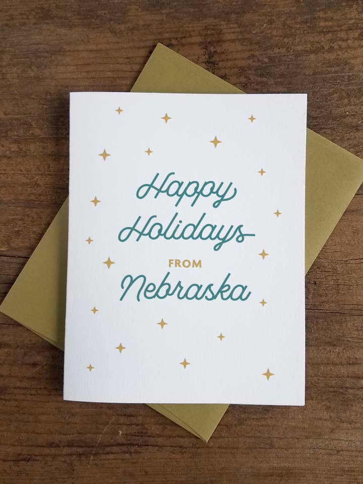 Happy Holidays from Nebraska - Tarjeta de felicitación para venta al por mayor de Iron Leaf Press