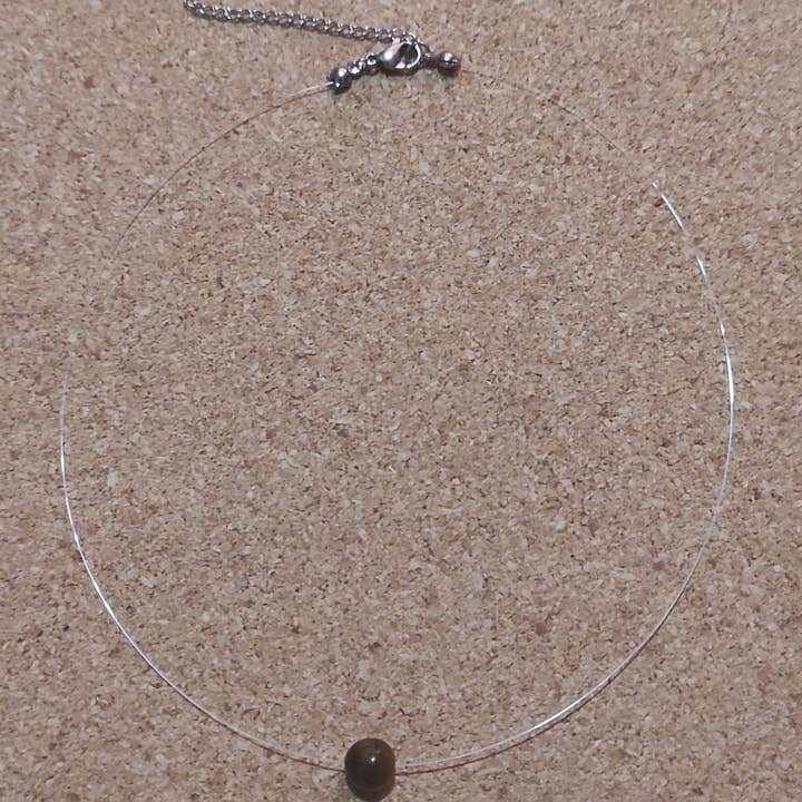 Single perlekæde med naturlig tigerøje på nylontråd for engroshandel hos Tendances perles