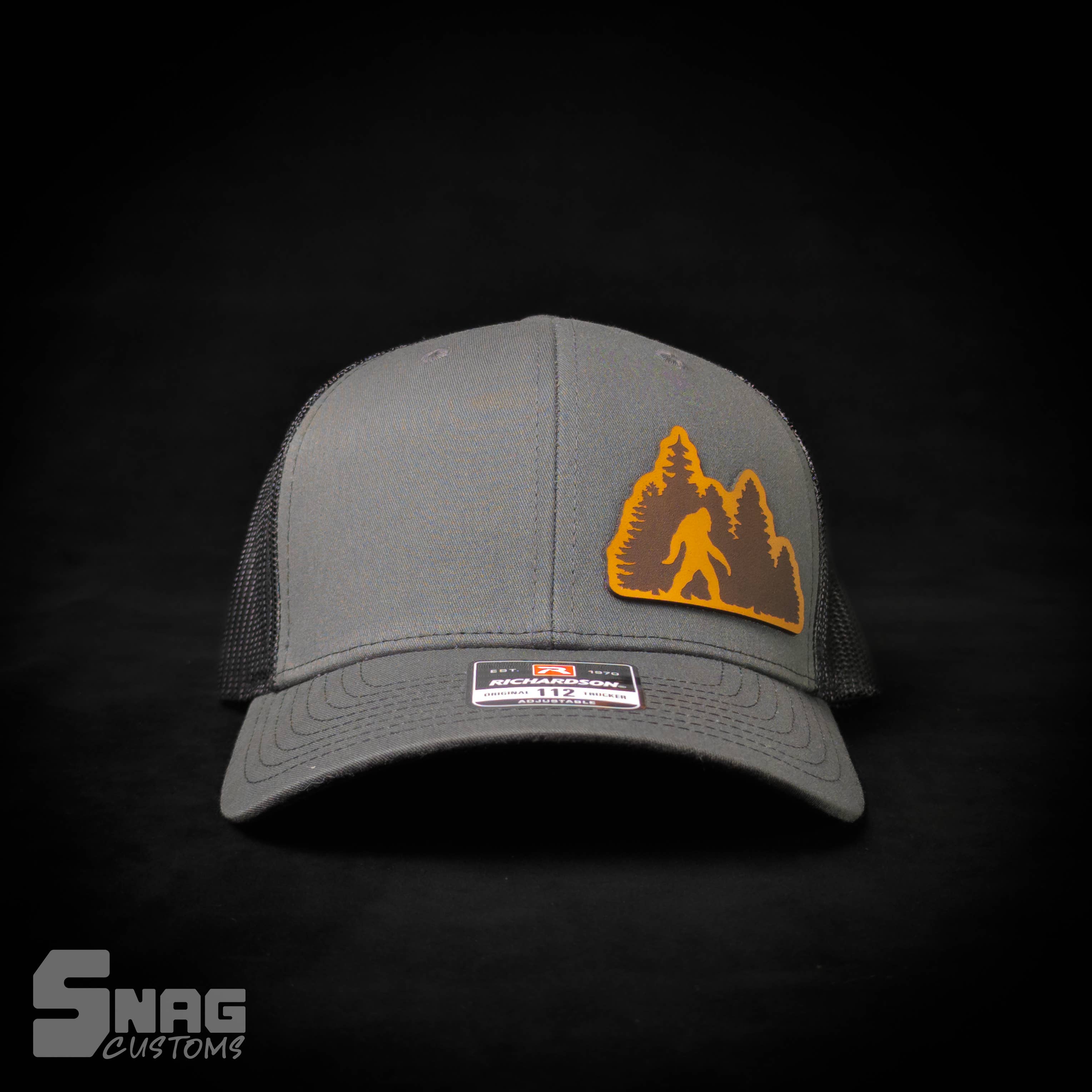 Snag Customs - Wholesale Trucker Hat - Unisex - Woods/Forest Sasquatch, Yeti, Bigfoot Leather Patch Hat3