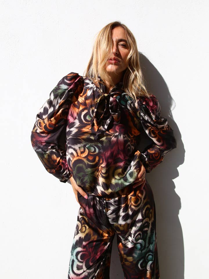 PUFF SLEEVE SHIRT WITH BOW AT NECK MULTICOLOR FEATHERS for wholesale on Faire0