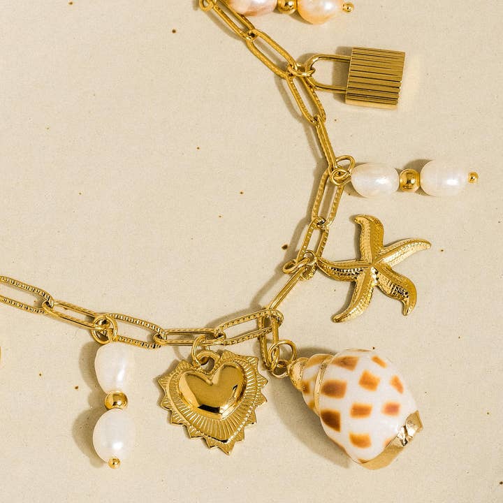 Ophélie 18K Gold Non-Tarnish Shell and Pearl Charm Necklace for wholesale on Faire