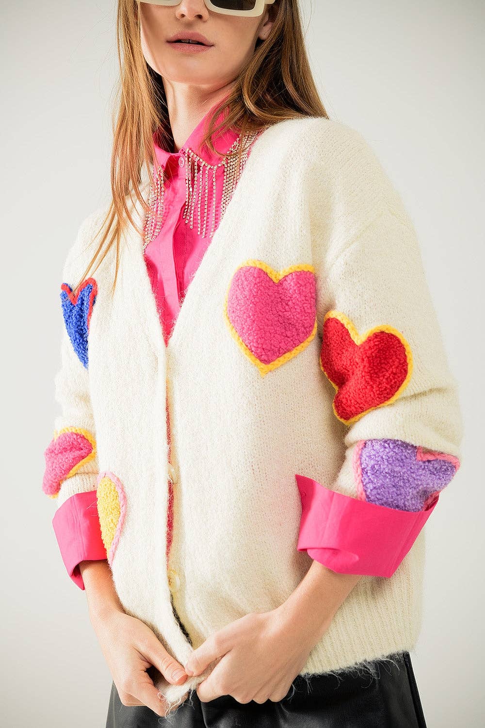 Beige knitted cardigan with embroidered hearts for wholesale on Faire0