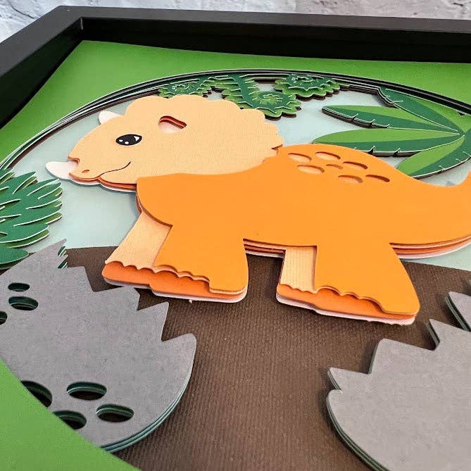 Olivia Reagan Designs – wholesale Dimensionell/3D-väggkonst – Triceratops tecknad 3D-papperskonst i en skugglåda