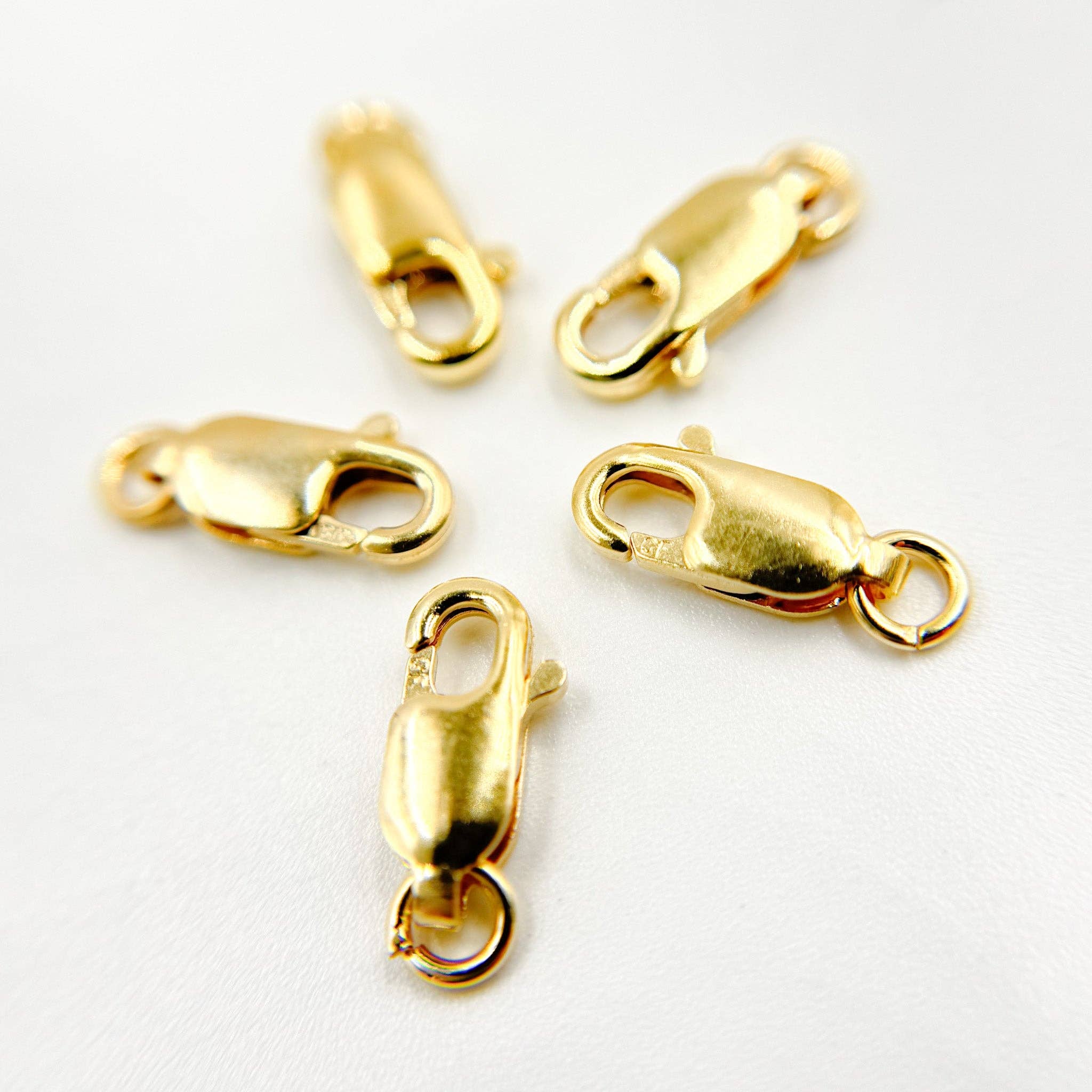 Tresor Jewelry Inc. - Wholesale Sluiting - 2925LC1WRGF. 10mm Gold Filled Karabijnsluitingen1