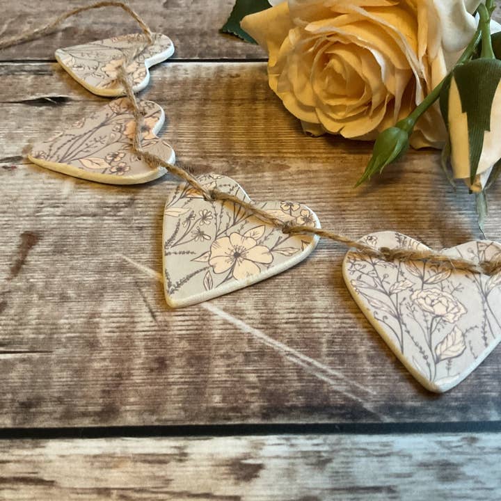 Grey & Peach Floral Clay Hearts Garland for wholesale by Cornucopia Creative Studio