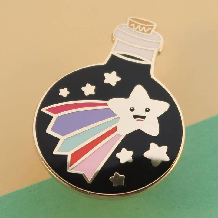 Super Star – Fame and Fortune Potion Bottle Enamel Pin badge for wholesale by Bird House Press