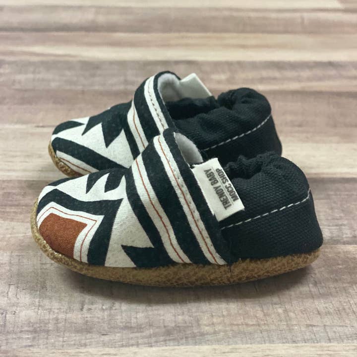 Orange & Black Tribal Moccasins for wholesale by Trendy Baby Mocc Shop
