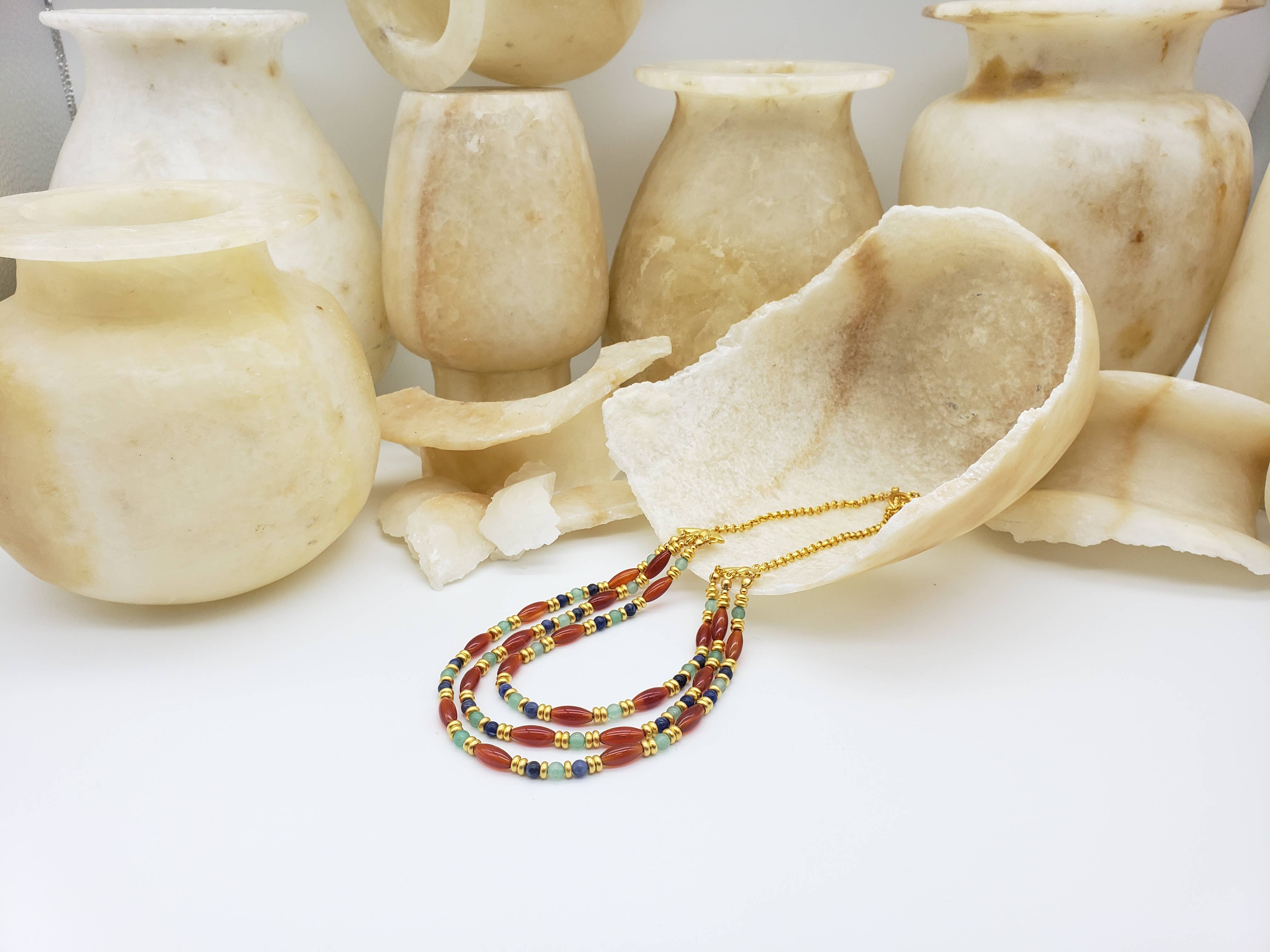 Discoveries, Inc. - Vendita all'ingrosso Collane di perline/perle - Collana Cleopatra in Corniola - Ispirata all'Egitto1