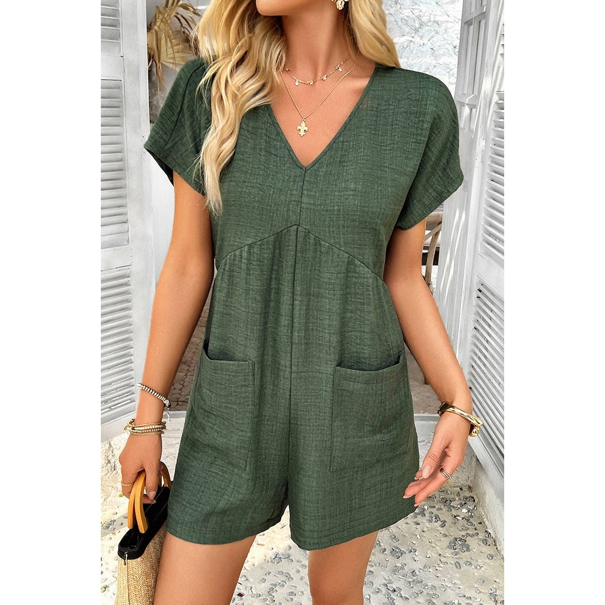 Elings – Großhandel Romper – Damen – Solider Tiefer V-Ausschnitt Drop-Shoulder-Loser Jumpsuit mit Taschen7
