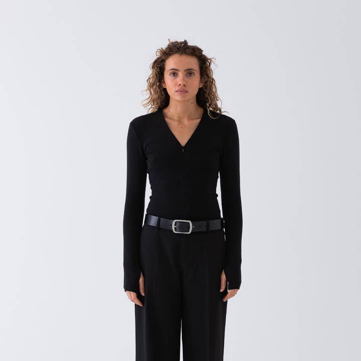 Demi Zip Top - Black and other Purchase Wholesale demin water. Free Returns & Net 60 Terms on Faire trending on Faire.