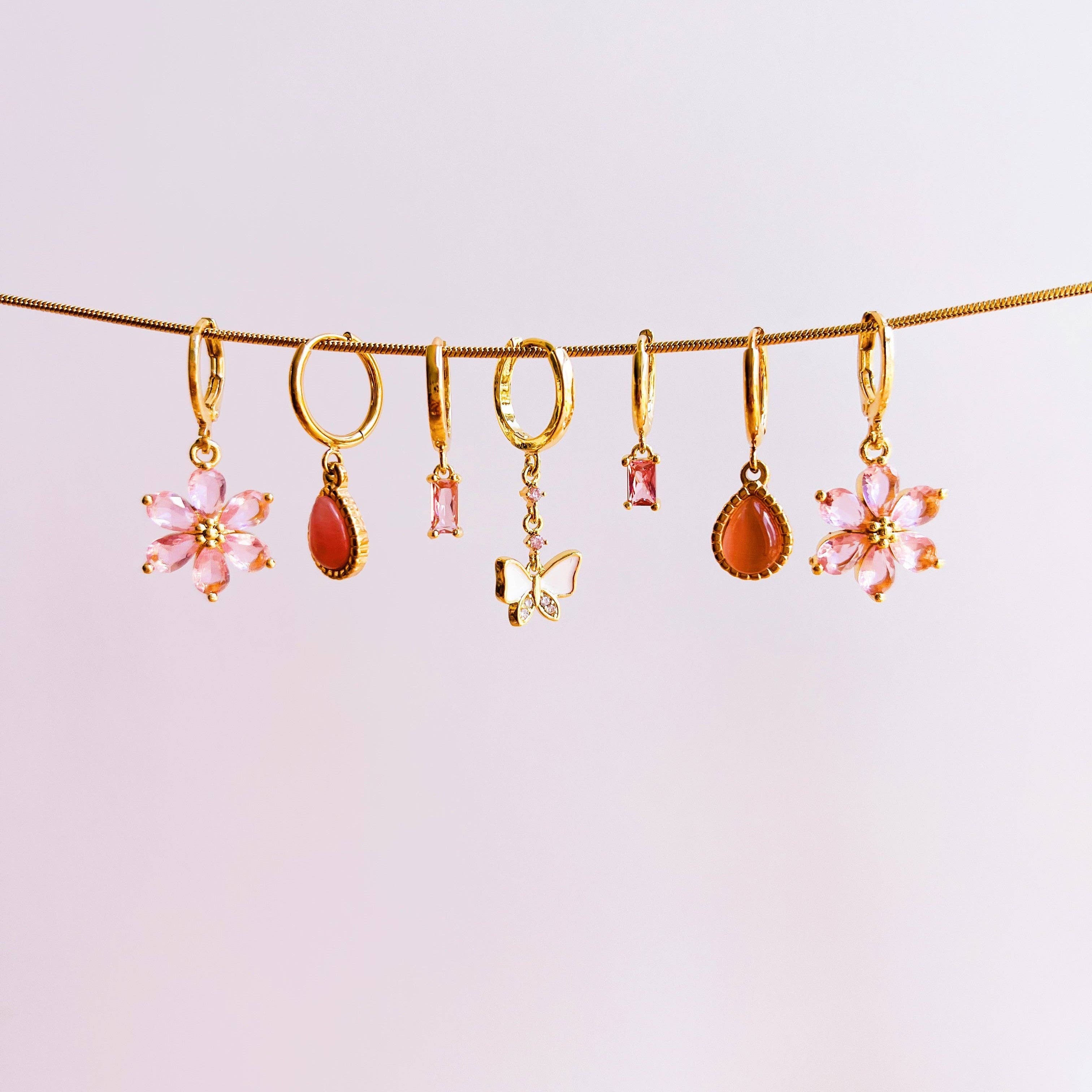 Gold Shining flower pink earrings for wholesale on Faire3