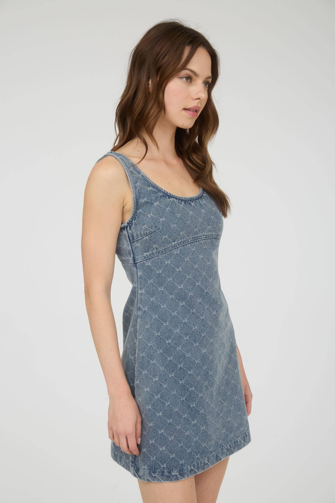 BOW PATTERN SLEEVELESS DENIM MINI DRESS for wholesale on Faire2