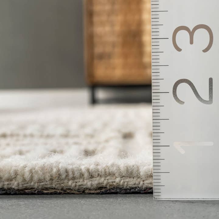 Ivory Mallory Hooked Wool Geometric High Low Textured Area Rug for wholesale on Faire