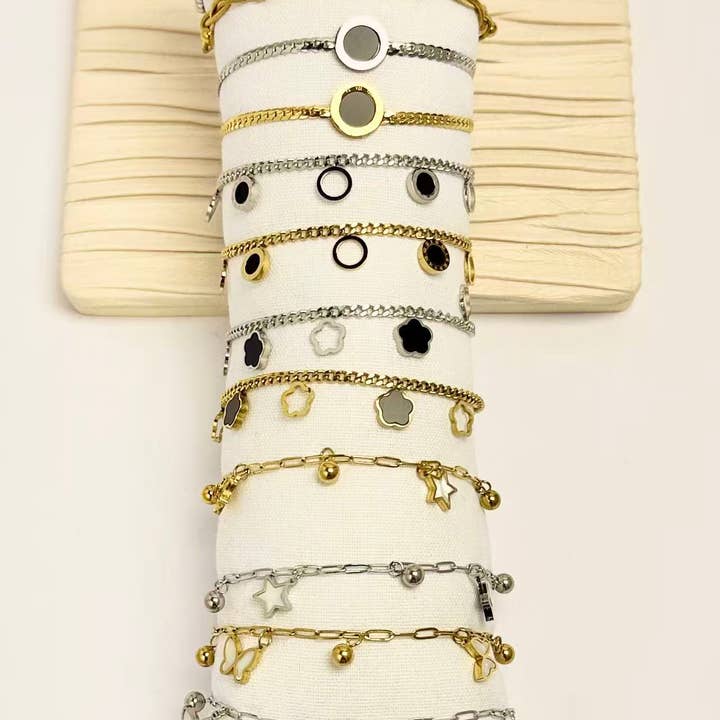 COSMOS - Wholesale Jewelry Set - Set of 12 gold and silver charm bracelets in steel1