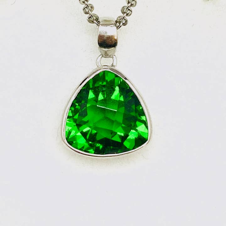 Twan Kee Jewelry – wholesale Individual charm/pendant – Mt St Helens Helenite Trillion Bezel Sterling Silver Pendant