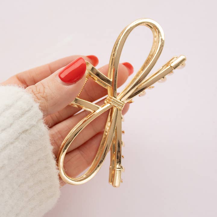 Gold Bow Claw Clip for wholesale by TreatBox