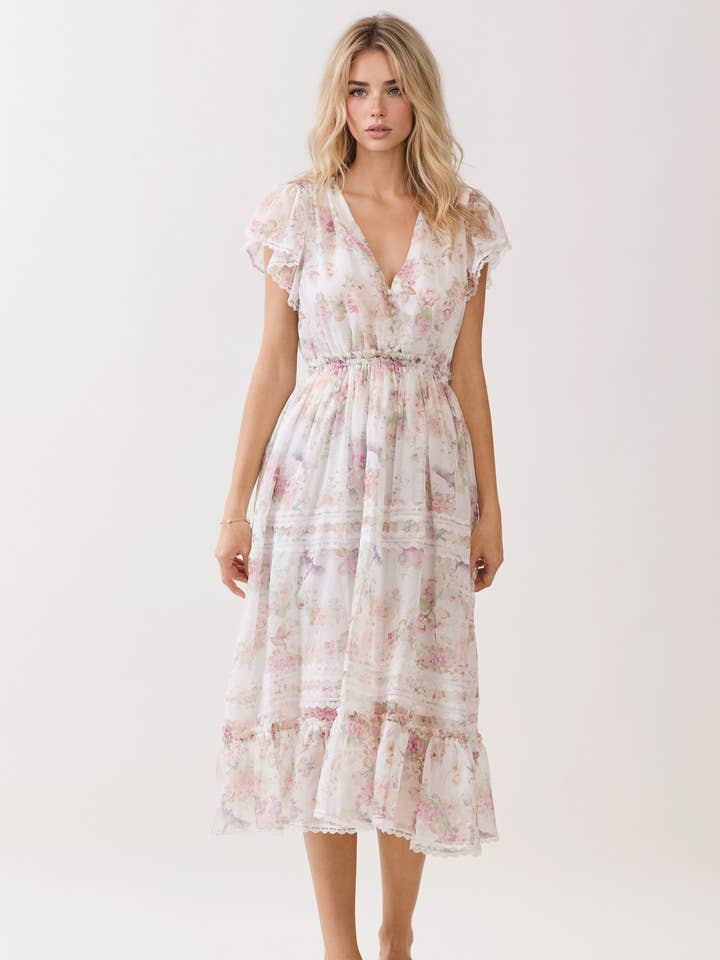 ABITO STAMPATO CON DETTAGLIO ARRICCIATO E ORLO A BALZE per la vendita all'ingrosso da parte di Dear Daisy