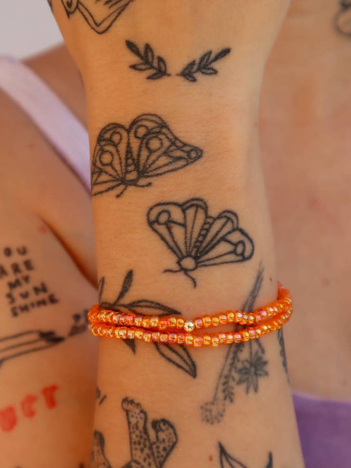 Mel B Rainbow Orange Boho Colorful Friendship Bracelet for wholesale by Sundrenchd