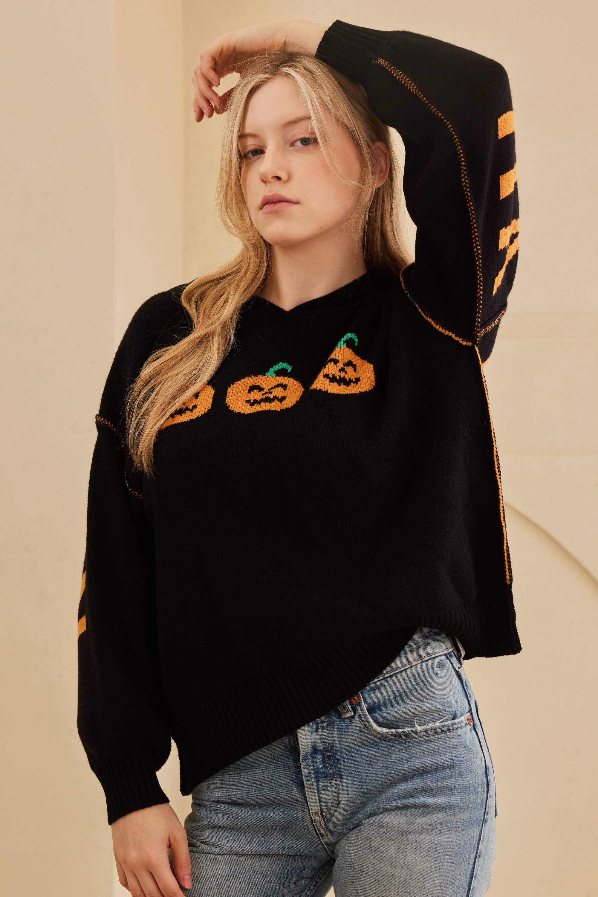 Black Hooded Halloween Sweater with Jaco O Embroidery for wholesale on Faire2