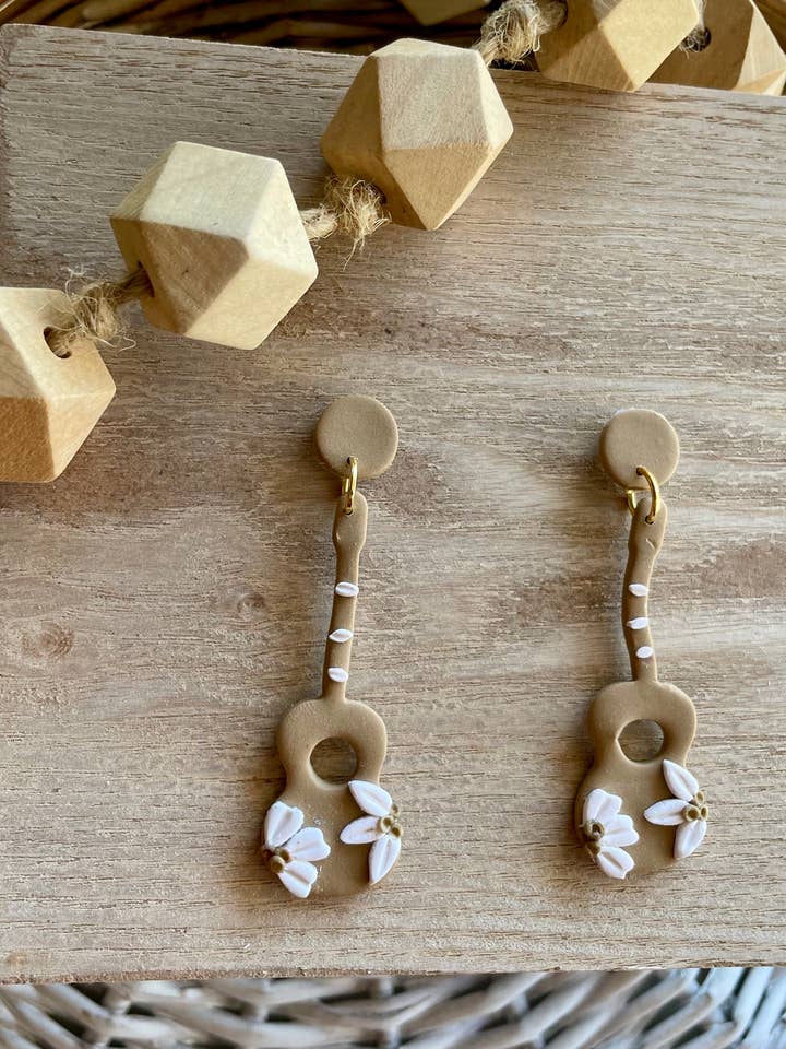 The Dolly's - Dark tan with white flowers. for wholesale by sammijean.clay