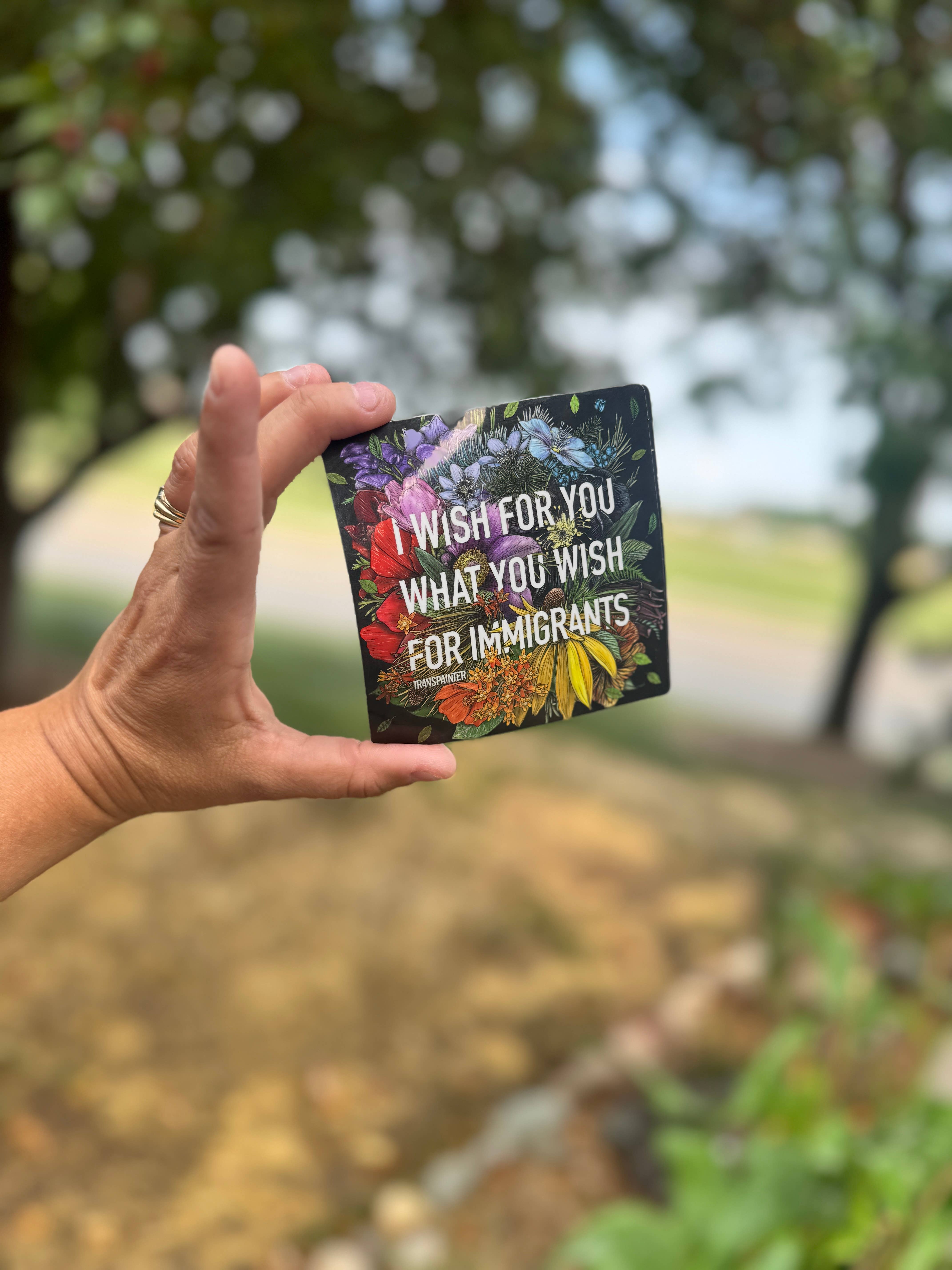 Transpainter - Wholesale Sticker - Immigrant Rights Sticker: Rainbow Floral Political Stickers1