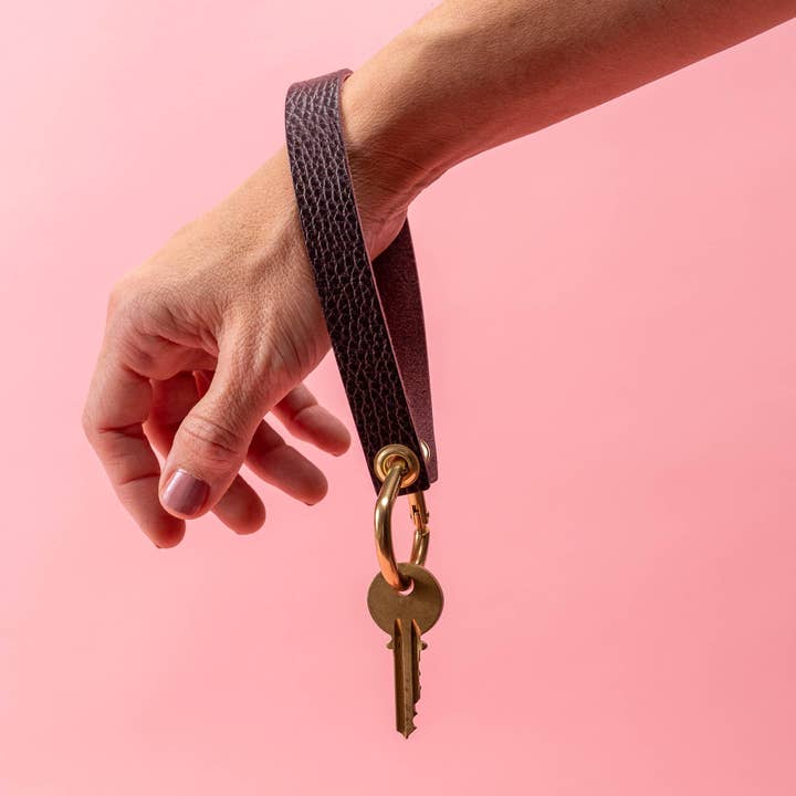 Bordeaux Dollaro Lederhandgelenktasche für den Großhandel von Avryn Co.