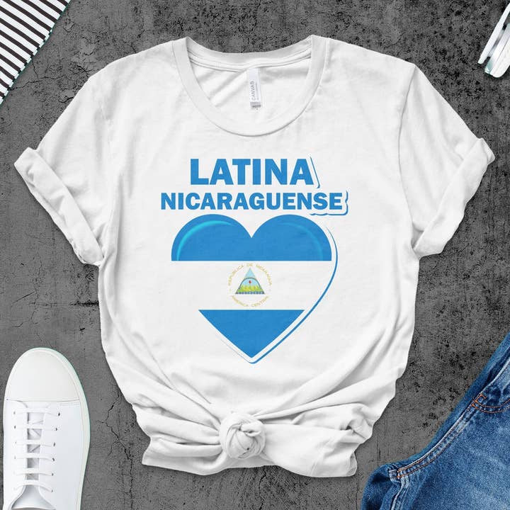 Nicaraguan Pride T-Shirt, Latina Nicaraguense Heart Flag Tee, Cultural Heritage Shirt, Central America Apparel, Patriotic Gift for wholesale by FreakyTeeFactory