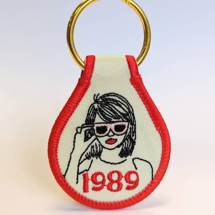 Swiftography: 1989 Embroidered Key Tag for wholesale by He Said, She Said