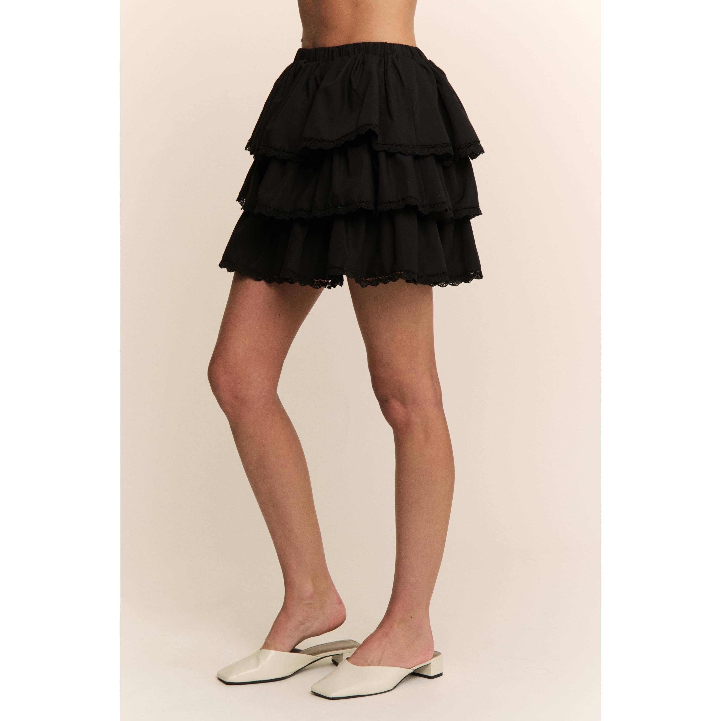 Black WESTERN SOLID MINI TIERED SHIRRING SKIRT SKORT for wholesale on Faire9