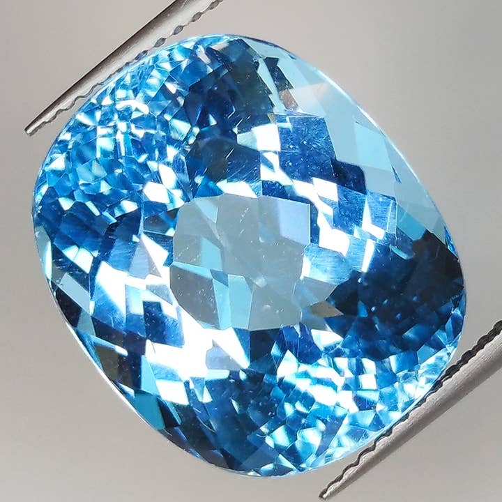 22.68ct Topacio Azul talla cojín 17.2x14.3mm para venta al por mayor de Naturjoya
