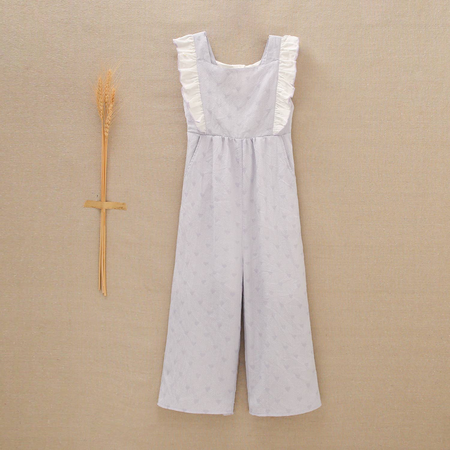 Lilac Girl's Jumpsuit With Hearts And Ruffles for wholesale on Faire1