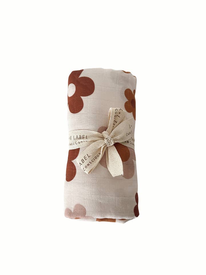 Organic cotton swaddle - Oopsi Daisy for wholesale by Lion + Lamb the Label